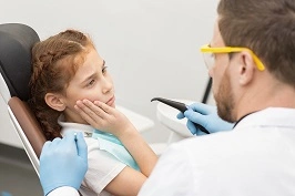 What are the common causes of toothache in children?